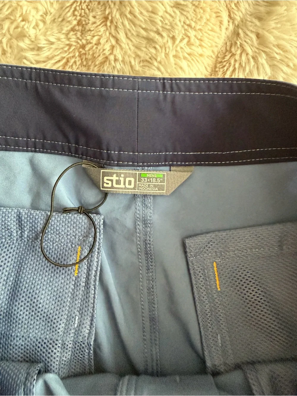 Stio Men's Blue Swim Hybrids with Orange Zip Accent